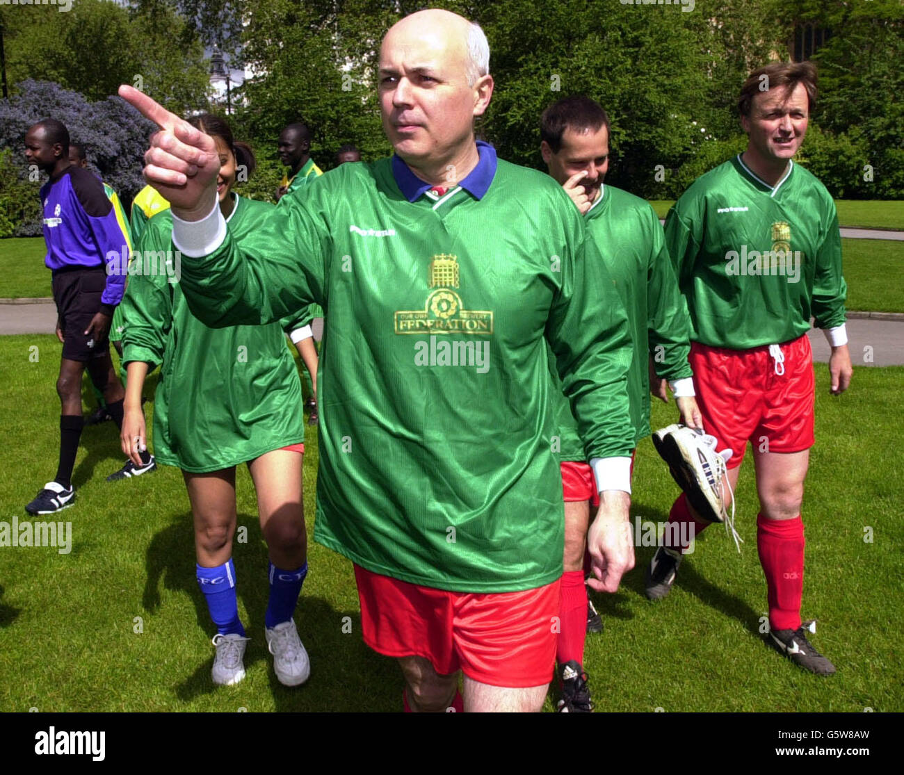 Conservative Party leader Iain Duncan Smith (centre) with his team mates before a football game for the Parliament team as part of the Nation's Football Festival in Westminster, London. Other teams involved in the festival comprise of asylum seekers and refugees. Stock Photo