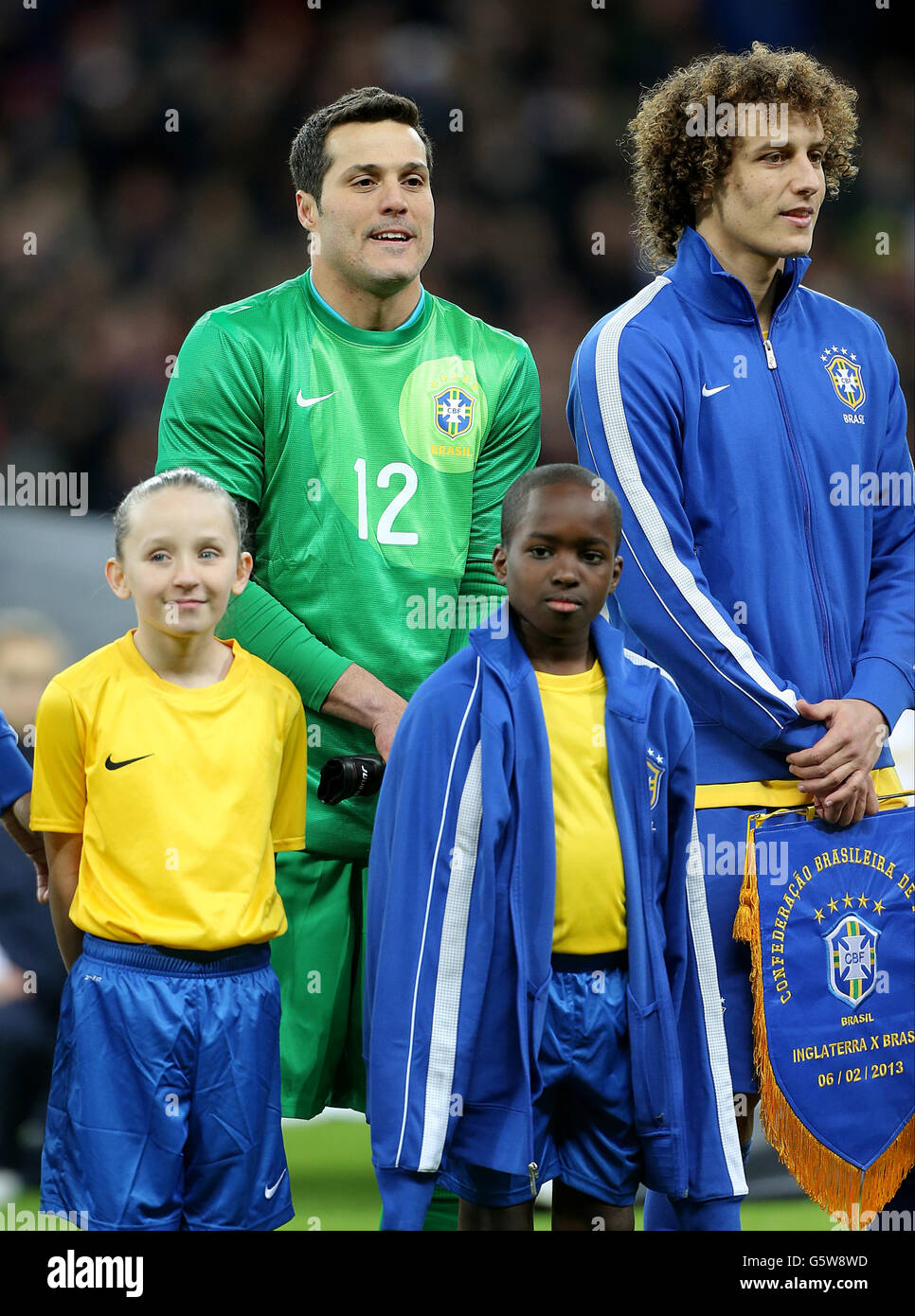 Soccer - International Friendly - England v Brazil - Wembley Stadium. Brazil goalkeeper Julio Cesar (left) with David Luiz Stock Photo