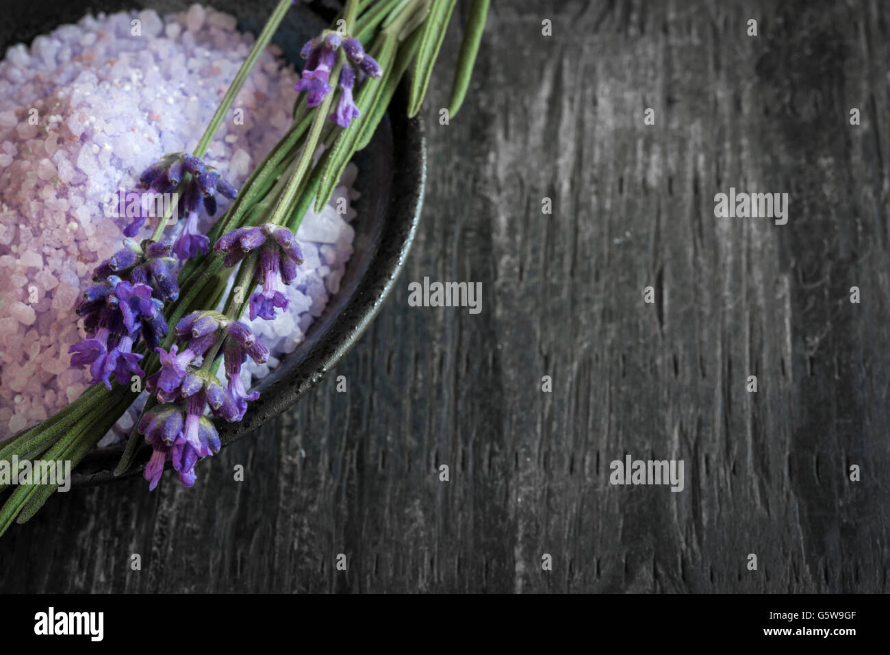 Bath salts herbal body care product with fresh lavender on rustic wooden background, copy space Stock Photo