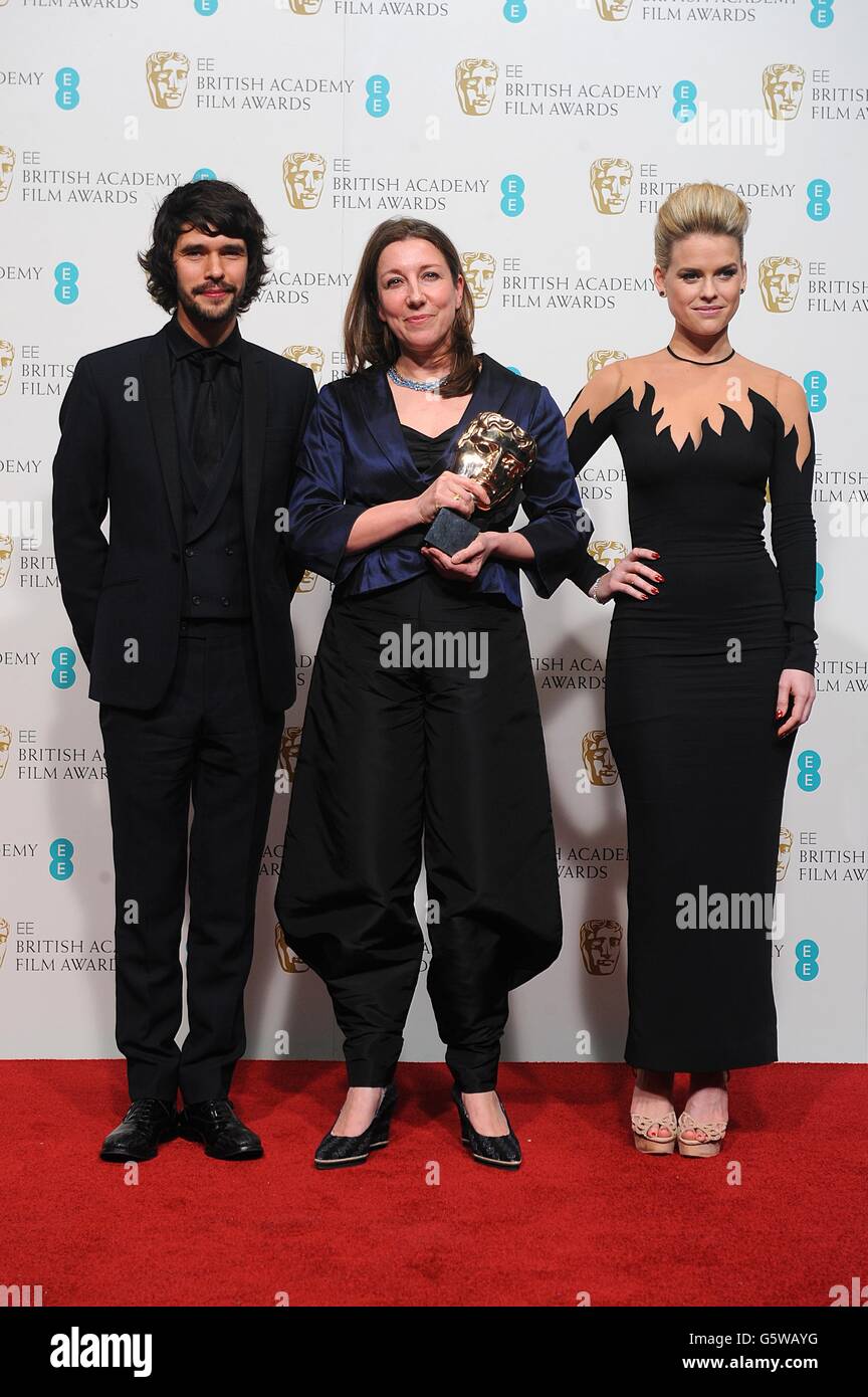 Ben Wishaw, Jacqueline Durran with the award for Best Costume Design for 'Anna Karenina' and Alice Eve in the press room at the 2013 British Academy Film Awards at the Royal Opera House, Bow Street, London. Stock Photo