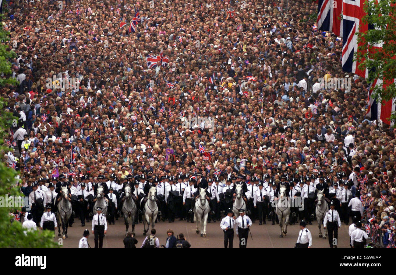 The scene from the roof of Buckingham Palace as crowds gather to watch the Jubilee Flypast of 27 aircraft including the Red Arrows and Concorde fly above The Mall to mark the Queen's Golden Jubilee. * It was the largest formation flight over London since 1981. Up to one million people are thought to have been in central London for the day of celebration. Stock Photo