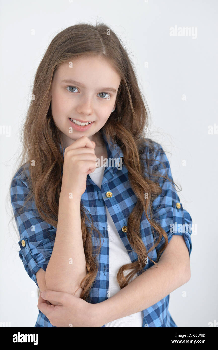 Portrait of a cute little girl posing Stock Photo - Alamy