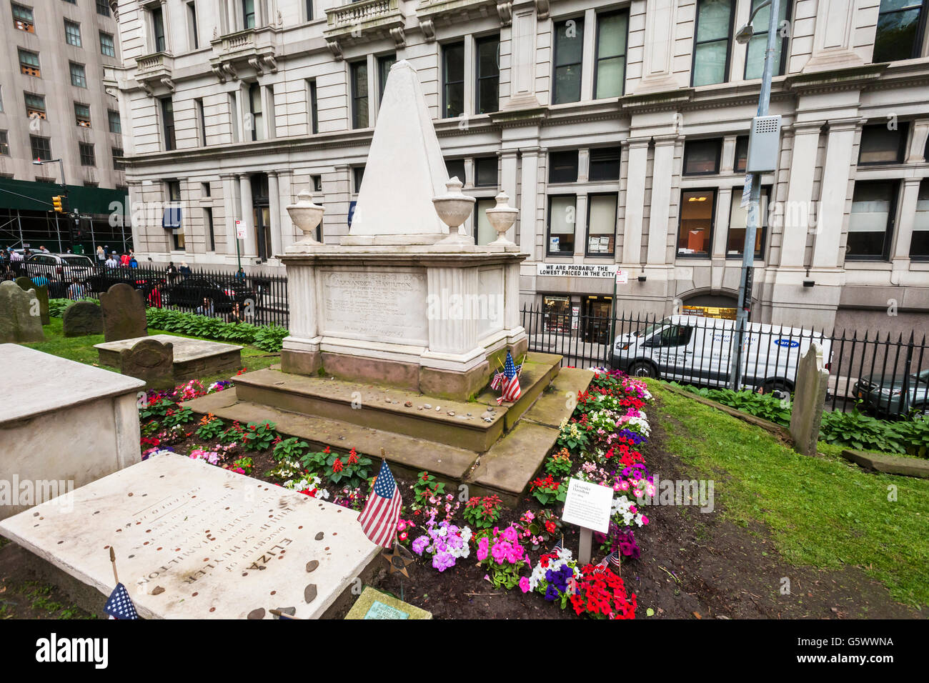 The grave of Alexander Hamilton in Trinity Church's cemetery in the Financial District of New York on Thursday, June 16, 2016. Because of the success of the musical 'Hamilton' on Broadway sites associated with him have seen an increase in interest and tourist traffic. (© Richard B. Levine) Stock Photo