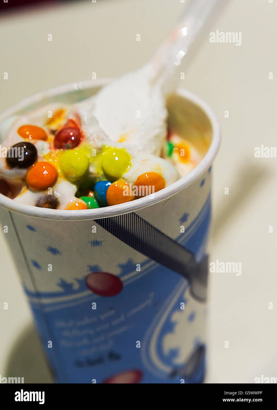 A mouth watering M&M McFlurry in a McDonald's restaurant in New York on Friday, June 17, 2016. Mars, the company behind the iconic M&M candies, is concerned about consumers eating too much sugar and is considering pulling their M&M's from fast food products such as the McFlurry, and Dairy Queen's Blizzard concoctions. Privately owned Mars Inc. is the world's largest confectioner and also makes Snickers, Mars Bars, Twix and other candies. (© Richard B. Levine) Stock Photo