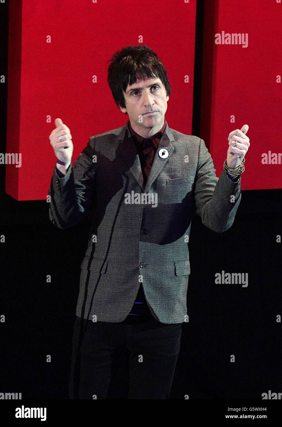 Johnny marr on stage during the 2013 nme awards hires stock