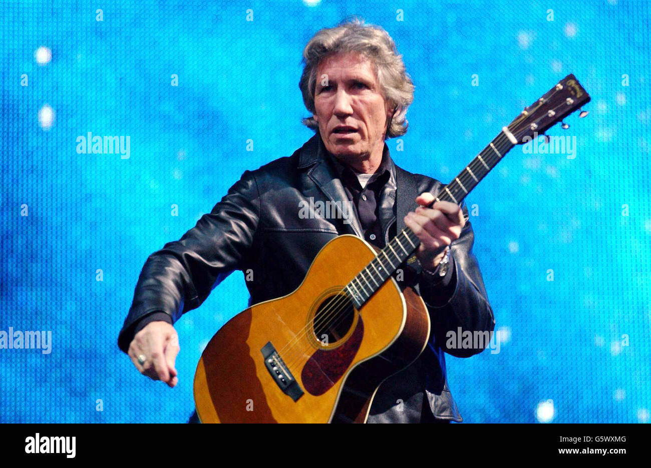 Roger Waters performing on the Pyramid Stage, during the final day of the Glastonbury Festival in Somerset. Stock Photo