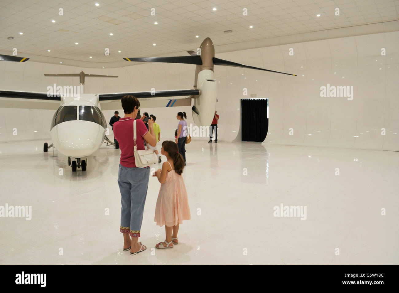 visitors and Leonardo AW 609 tiltrotor ( former BA 609 tilt rotor, Agusta Westland), Volandia fly museum, Malpensa, Varese, Italy Stock Photo