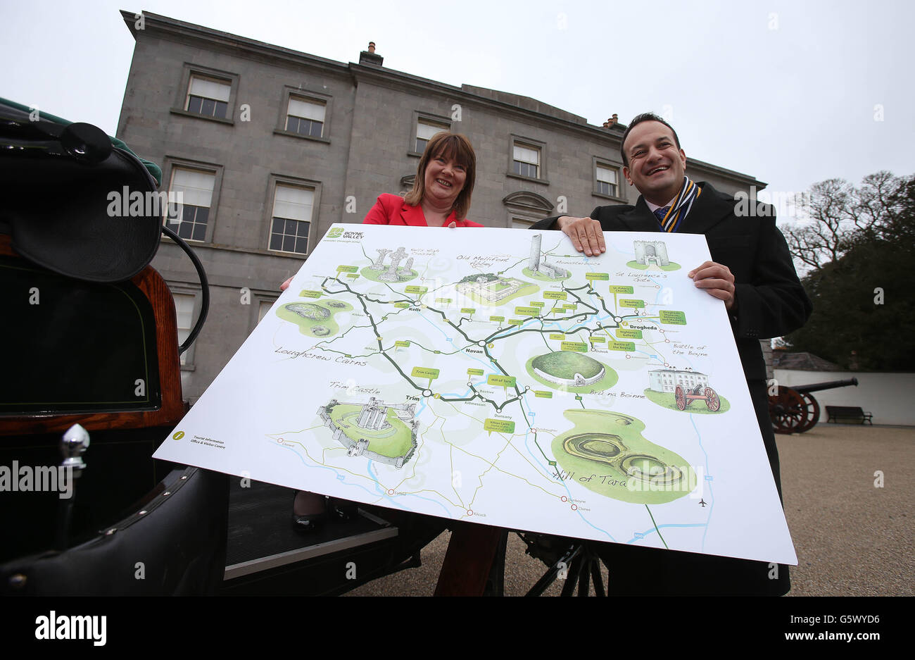 L-R Failte Ireland development officer Martina O'Dwyer and Tourism Minister Leo Varadkar hold a map of the new Boyne Valley tourist route at the site of the Battle of The Boyne near Droghed. The photocall was part of the launch of The Boyne Valley Drive, 225 kilometers in length and taking in 22 historic sites along the way, is a collaborative project between Failte Ireland and the local authorities in Meath and Louth which seeks to revitalise the region and promote it as a must-visit destination for overseas tourists. Stock Photo