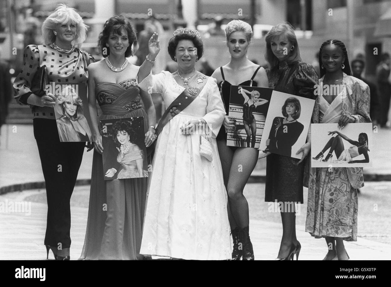 Winners of a Hollywood stars lookalike competition are presented to probably the most famous lookalike of them all, Jeanette Charles (centre), a double of the Queen, in London. The five winners of the Elida Pin Up contest are (from l-r) Nancy Smith (Linda Evans), of Perthshire; Mary Bennett (Joan Collins), of Liverpool; Stella Turnbull (Madonna), of Deal, Kent; Melanie Chichester (Victoria Principal), of Cardiff; and Eudora Okoro (Pattie Boulaye), of Liverpool. Stock Photo