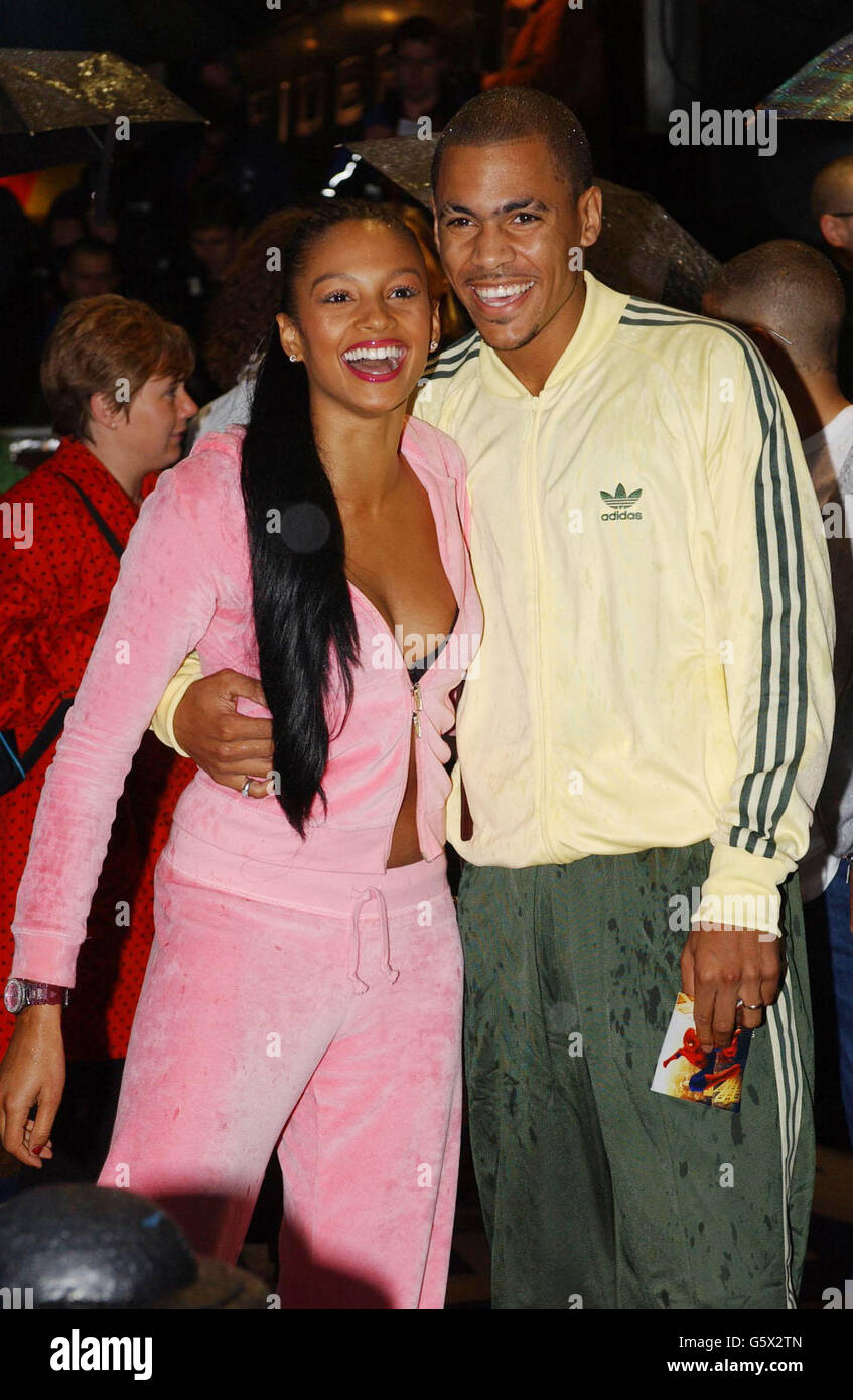 Alesha from girl band Mis-teeq with her partner So Solid Crew member Harvey arrive for the U.K. Premiere of Spiderman at the Odeon Cinema Leicester Square, London. Stock Photo