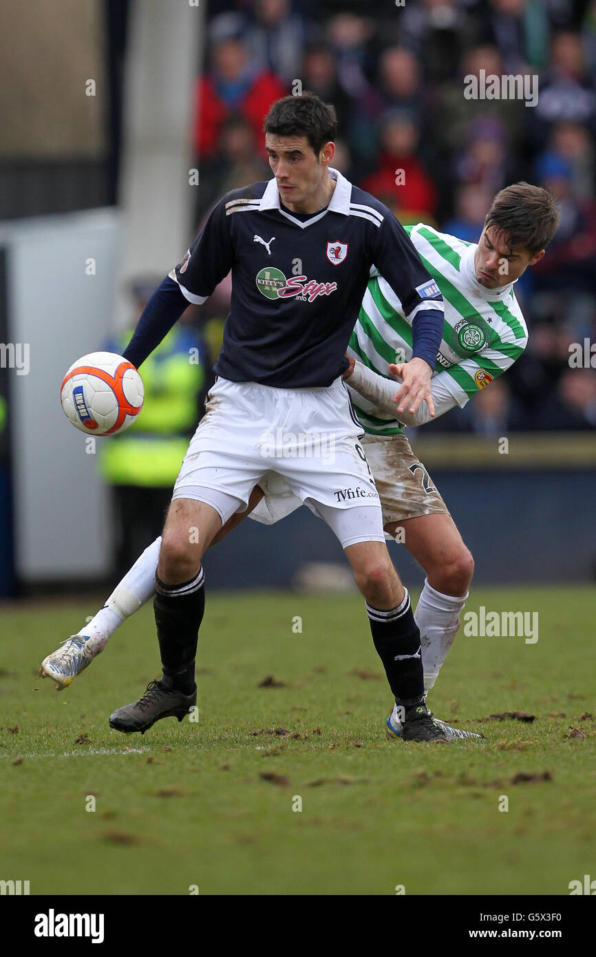 Soccer - William Hill Scottish FA Cup - Fifth Round - Raith Rovers v Celtic - Starks Park. Raith Rovers' Brian Graham (left) and Celtic's Mikael Lustig battle for the ball Stock Photo