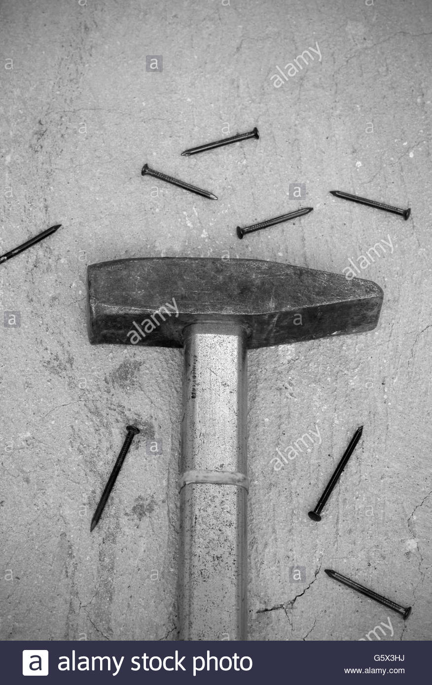 Hammer And Nail Black and White Stock Photos & Images - Alamy