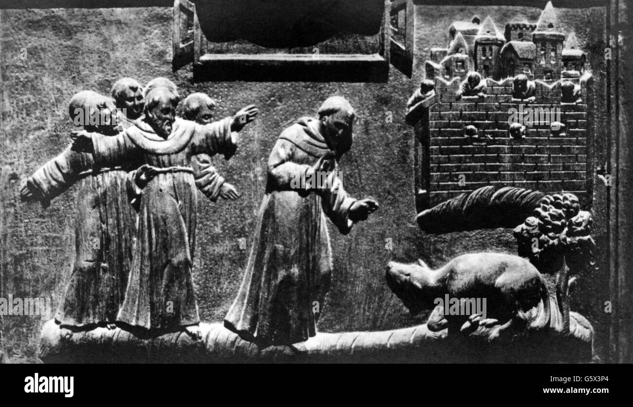 St. Francis of Assisi, circa 1181 - 3.10.1226, Italian clergyman, Saint, and the wolf of Gubbio, relief, basilica San Francesco, Assisi, 13th century, picture postcard, G. B. Falci, Milan, 1920s, Stock Photo