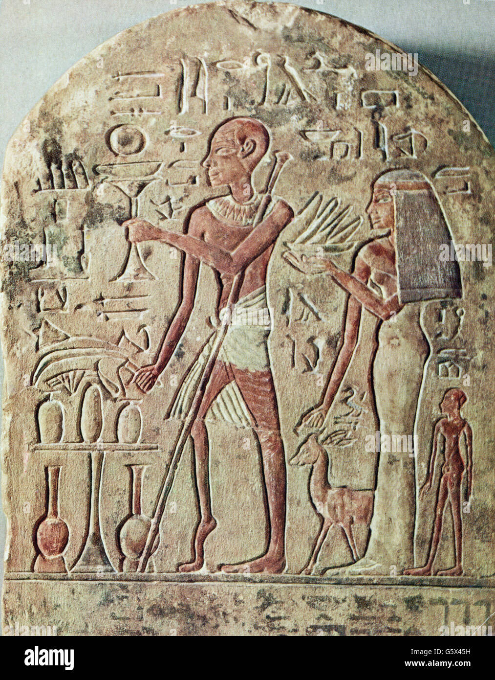 medicine,diseases,poliomyelitis,man with poliomyelitis,relief,painted,Egypt,Ny Carlsberg Glyptothek,Copenhagen,ancient world,ancient times,Egyptian,fine arts,art,sculpturing,script,scripts,hieroglyph,hieroglyphs,hieroglyphics,full length,standing,holding,hold,vessel,vessels,container,containers,clothes,loincloth,loin cloth,loincloths,loin cloths,crutch,crutches,sickness,sicknesses,sick person,sick people,sick,paralysed,physical handicap,physical disability,handicaps,handicapped person,disabled person,handicapped peo,Additional-Rights-Clearences-Not Available Stock Photo