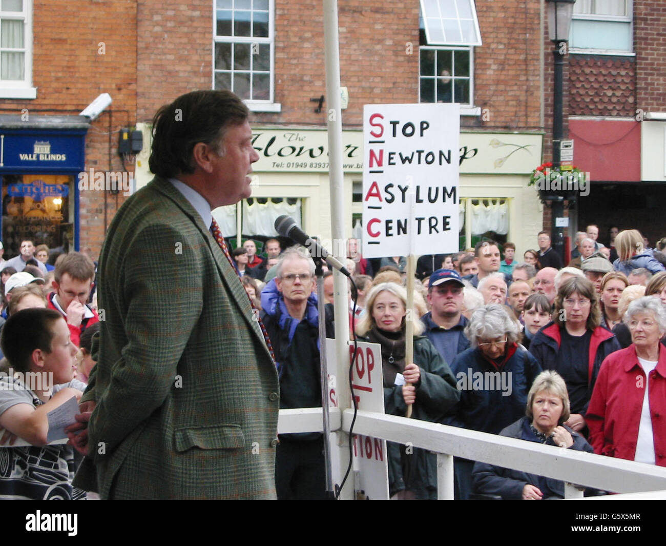 Local conservative MP Ken Clarke, addresses more than 1,500 people gather in the small market town of Bingham in Nottinghamshire to protest at plans to build a refugee centre nearby. The largest gathering Bingham has seen in more than four years, according to local police, saw residents from outlying villages gather to demonstrate against the Government plan to convert a former RAF base at Newton into an asylum seekers' camp. Stock Photo