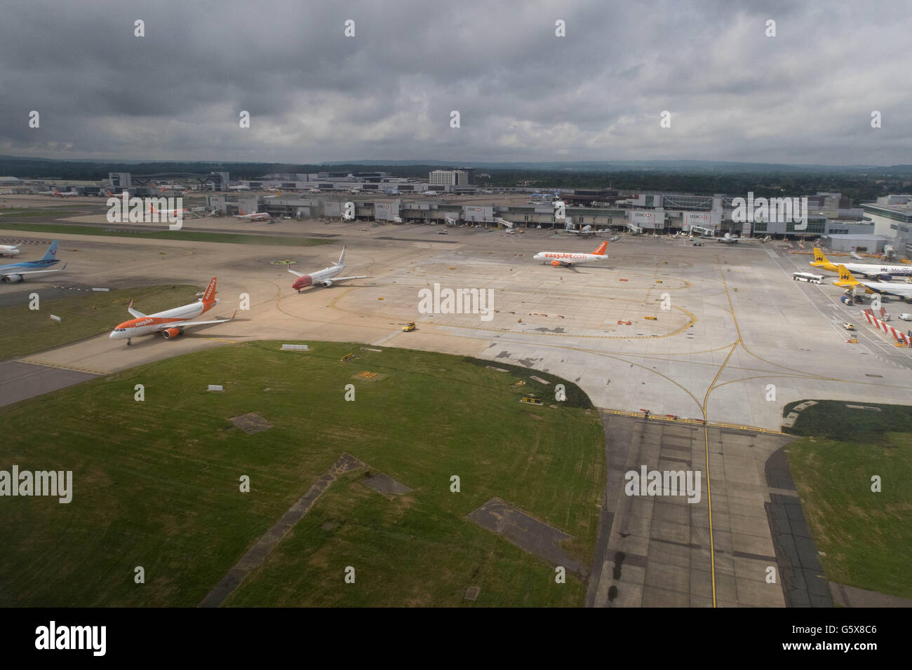 Planes around the runway at Gatwick airport. Stock Photo