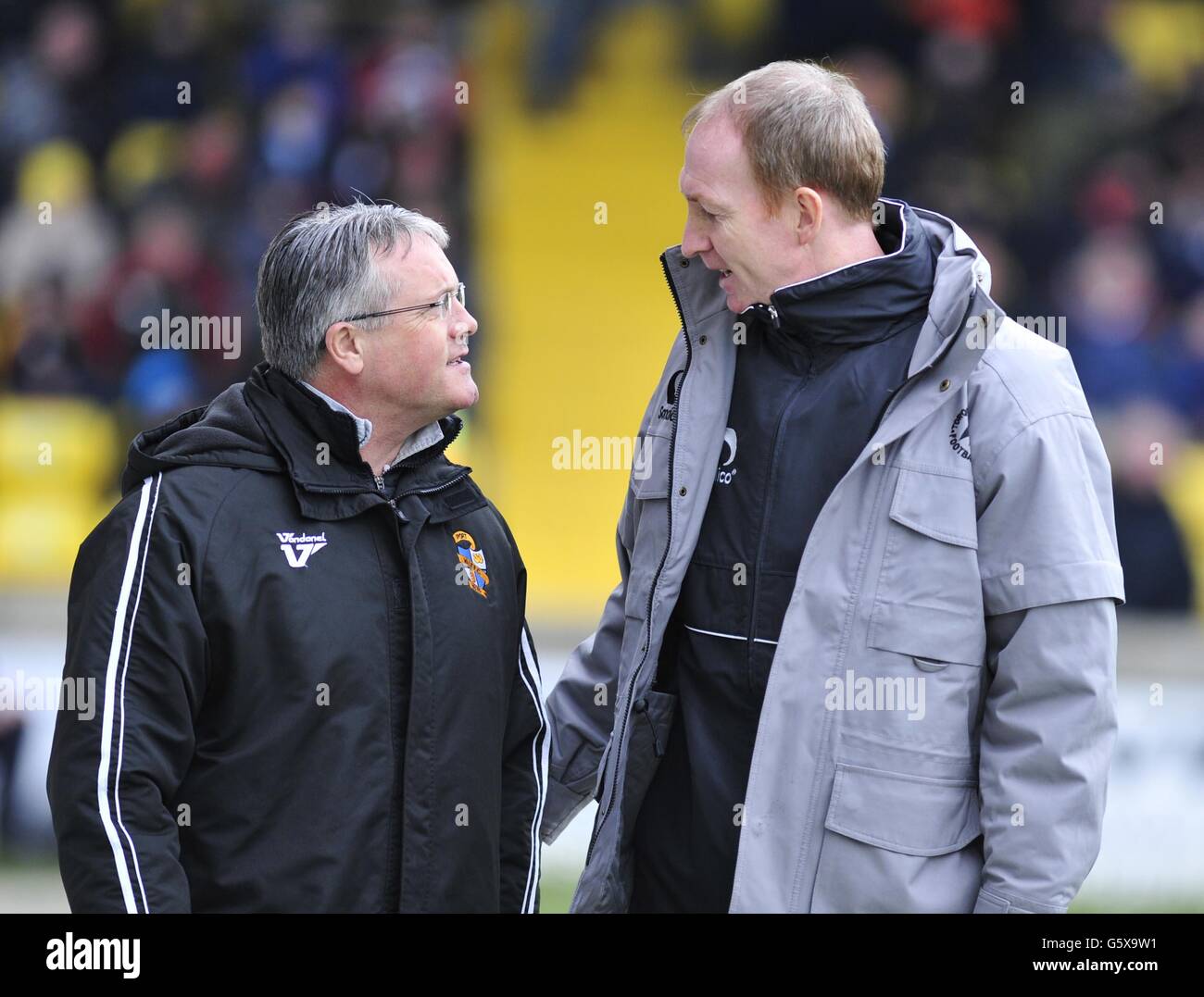 Soccer - npower Football League Two - Torquay United v Port Vale - Plainmoor. Port Vale manager Micky Adams (left) and Torquay United Interim manager Alan Knill before the npower League Two match at Plainmoor, Torquay. Stock Photo