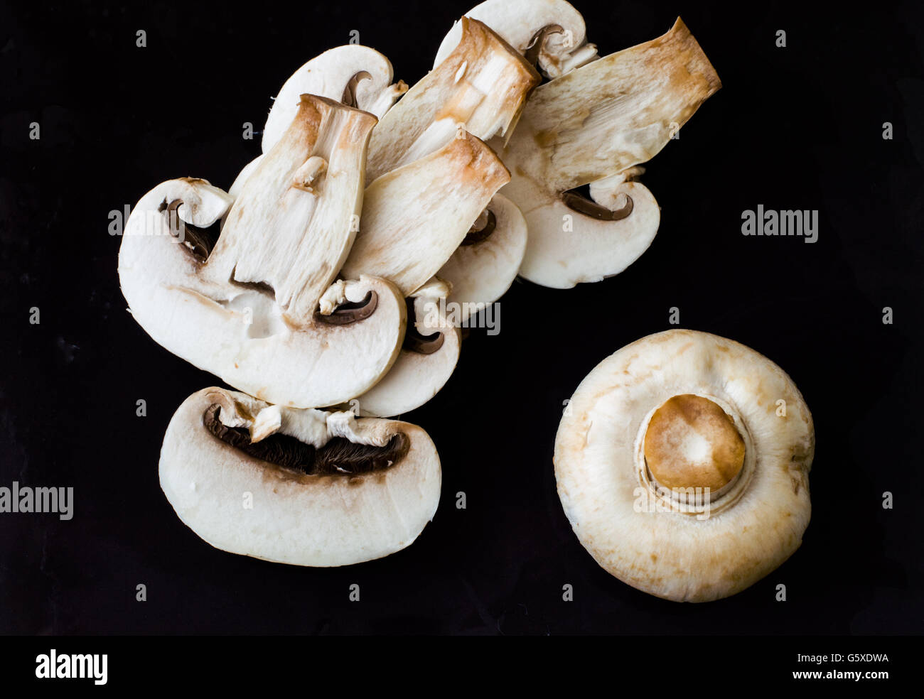 Top View of Sliced Fresh Mushrooms Before Cooking Stock Photo