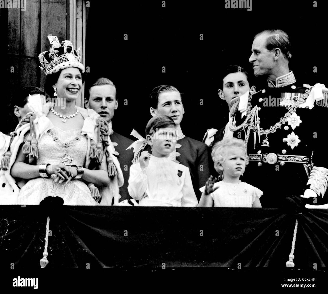 The Royal Family on the balcony at Buckingham Palace after the coronation at Westminster Abbey. Stock Photo