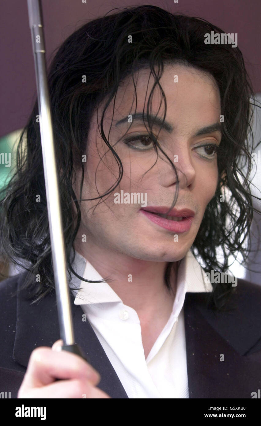 US singer Michael Jackson during a tour of the Houses of Parliment, in London. Jackson was the guest of Labour Peer Lord Janner, who fixed up the star's guided tour as a favour to his close friend, spoon-bending psychic Uri Geller. Stock Photo