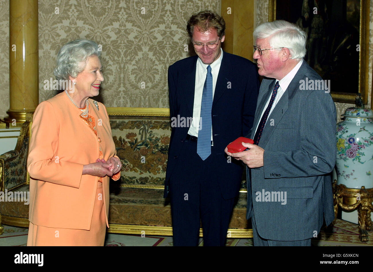 Britain's Queen Elizabeth II presents Peter Porter with her Gold Medal for Poetry during an audience at Buckingham Palace in London, also attended by Poet Laureate Andrew Motion (centre). * ... Born in Brisbane, Australia, in 1929, he has been writing poetry since he left school. In 1983, he won the Duff Cooper Memorial Prize for his first book of collected poems and in 1988 he won the Whitbread Poetry Award for the Automatic Oracle. The Gold Medal for Poetry was instituted by King George V in 1933 at thesuggestion of the then Poet Laureate, Dr John Masefield. Stock Photo