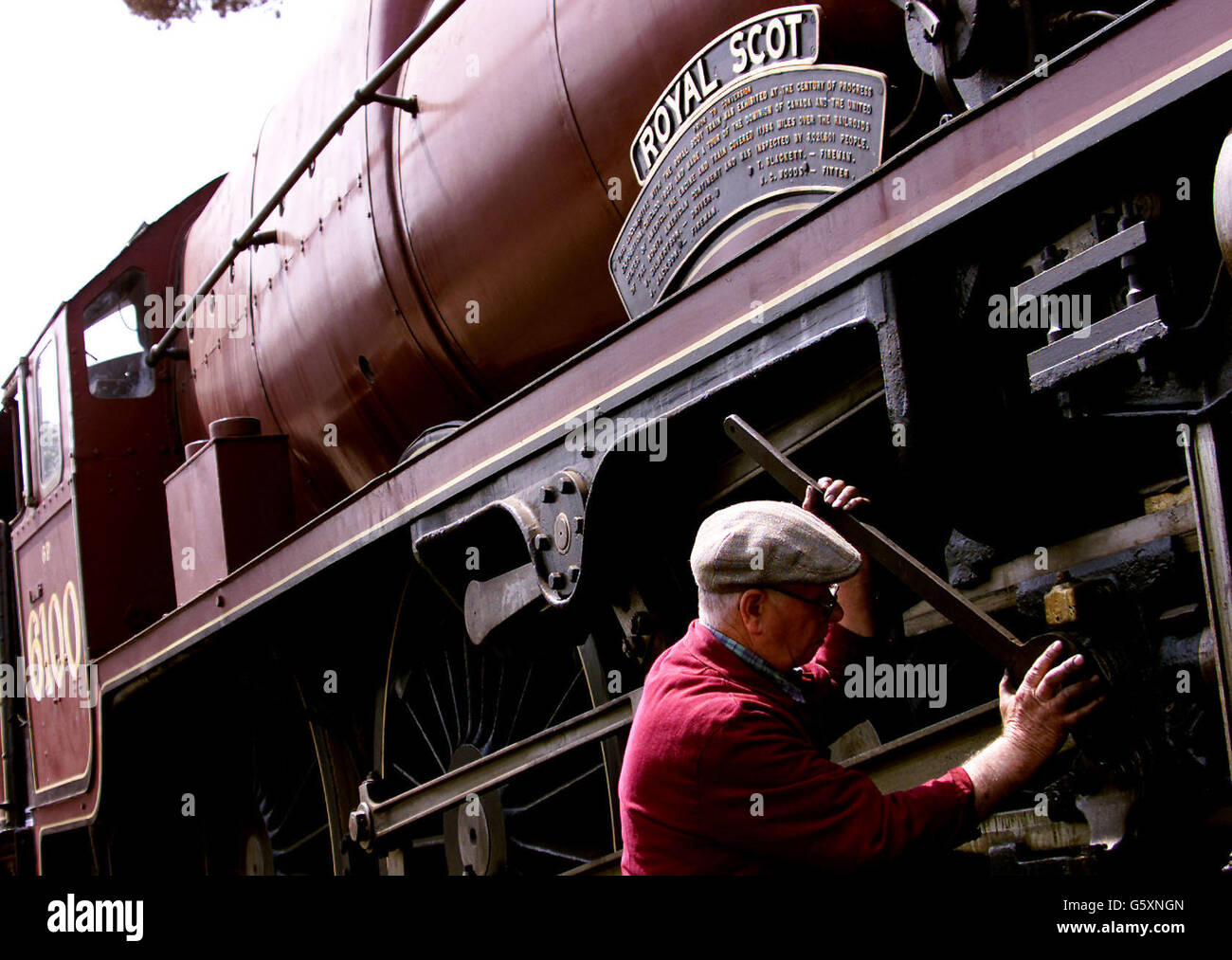 Train engineer Roger Garnham works on dismantling the steam locomotive Royal Scot at the Bressingham Steam Museum at Diss, Norfolk, where it is being overhauled thanks to a 339,000 heritage lottery cash grant. * The locomotive, built in 1927 at a cost of 7, 740, was the first of 71 Elite class 4-6-0 engines providing high speed transport between Euston, Manchester, Liverpool, Carlisle and Glasgow. The locomotive will be restored to full working order within four years. Stock Photo