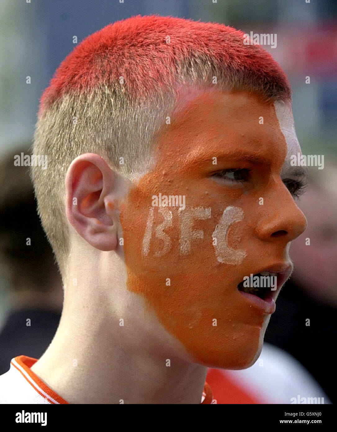 A colourful Blackpool football fan with painted face at the LDV Trophy Cup Final at the Millennium Stadium. Stock Photo