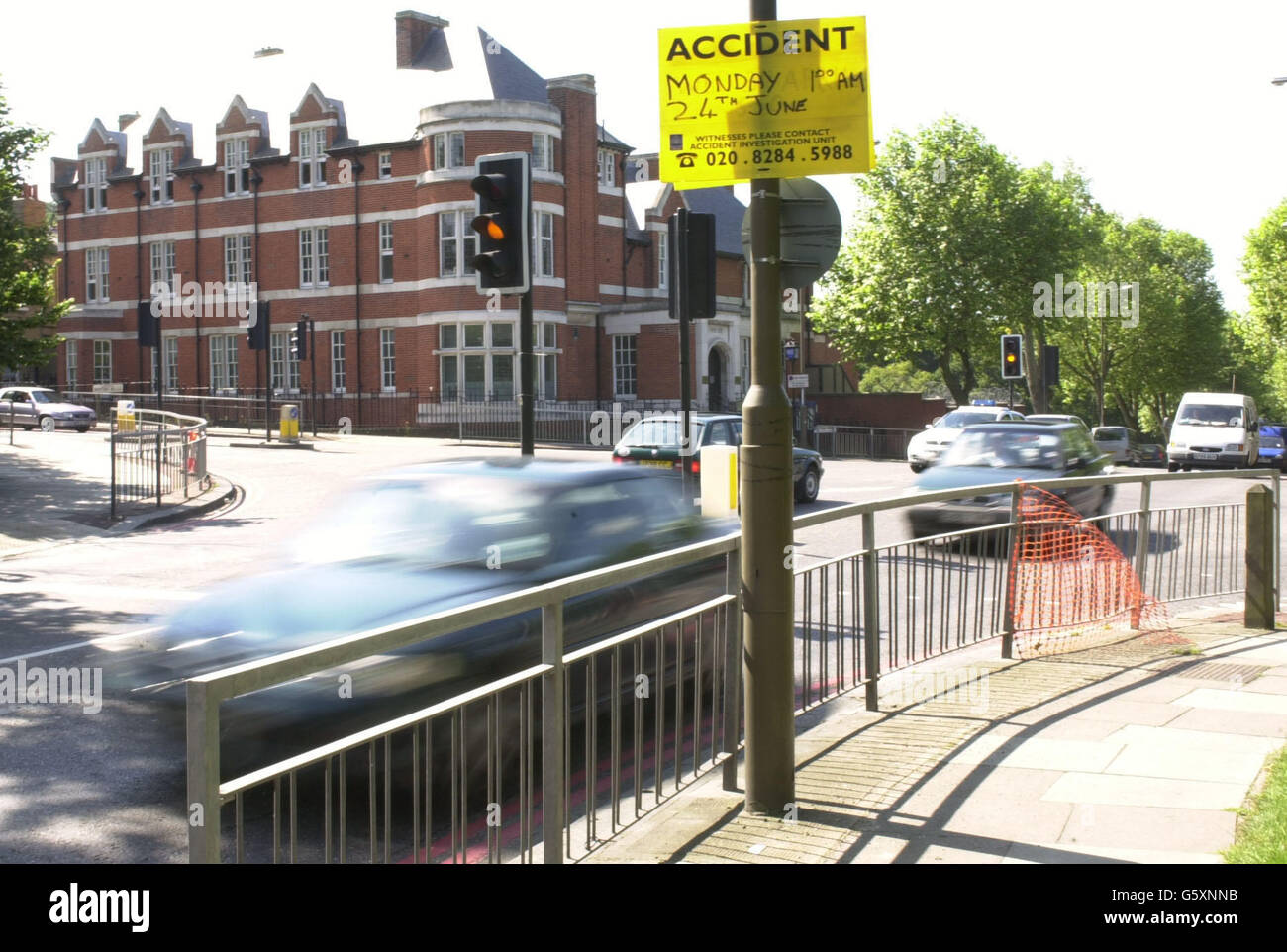 The road junction near Shooter's Hill police station (background) at Shooter's Hill, south east London, where a woman was knocked down and killed by a police car. The Vauxhall Astra police car struck the 29-year-old woman shortly after 1am, a spokesman said. The response vehicle was on its way to an emergency call with its blue lights in operation. She was pronounced dead at the scene at 1.45am. Stock Photo