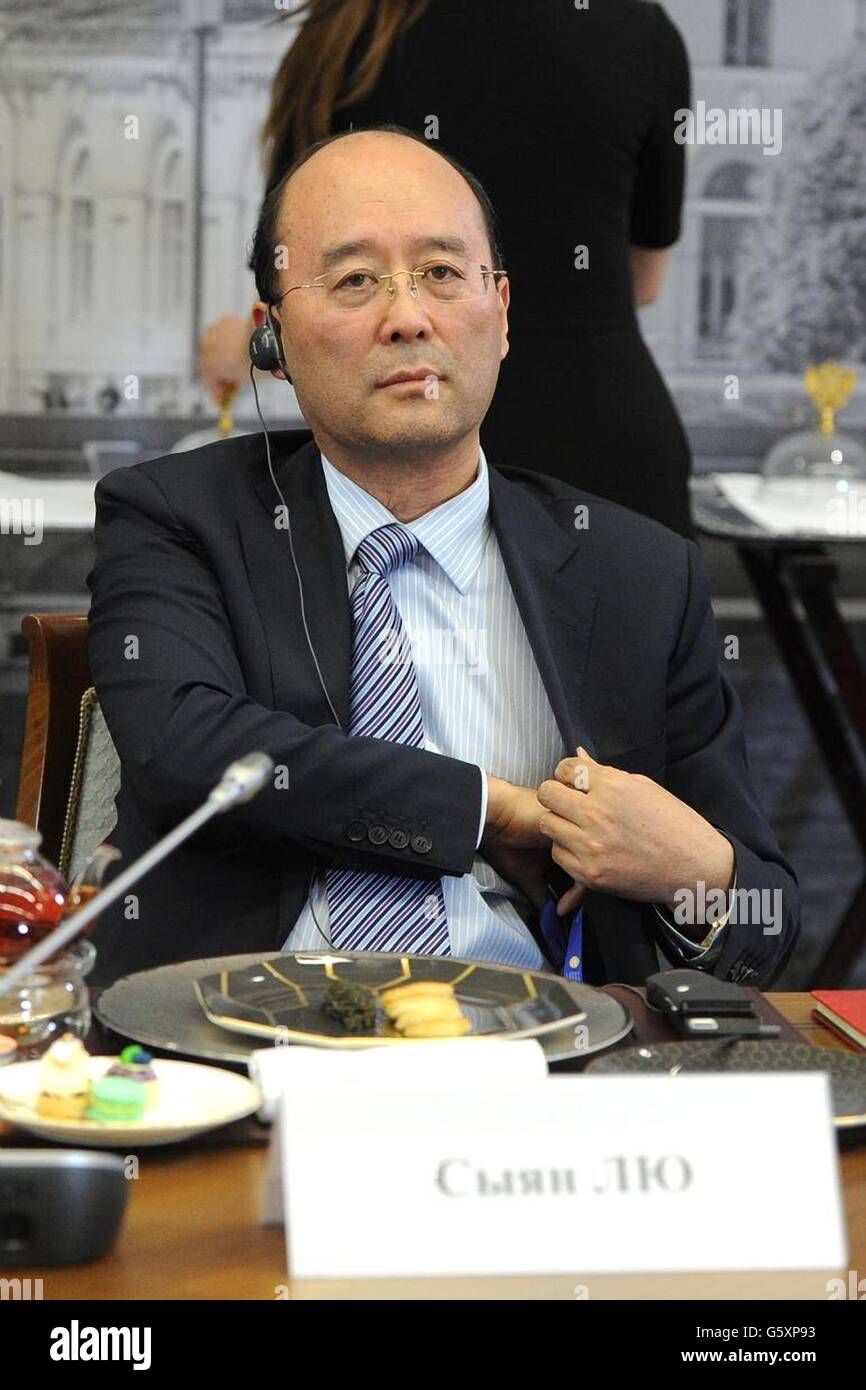 Vice President of Xinhua News Agency Liu Siyang during a meeting with Russian President Vladimir Putin and international news agencies on the sidelines of the St. Petersburg International Economic Forum June 17, 2016 in St. Petersburg, Russia. Stock Photo