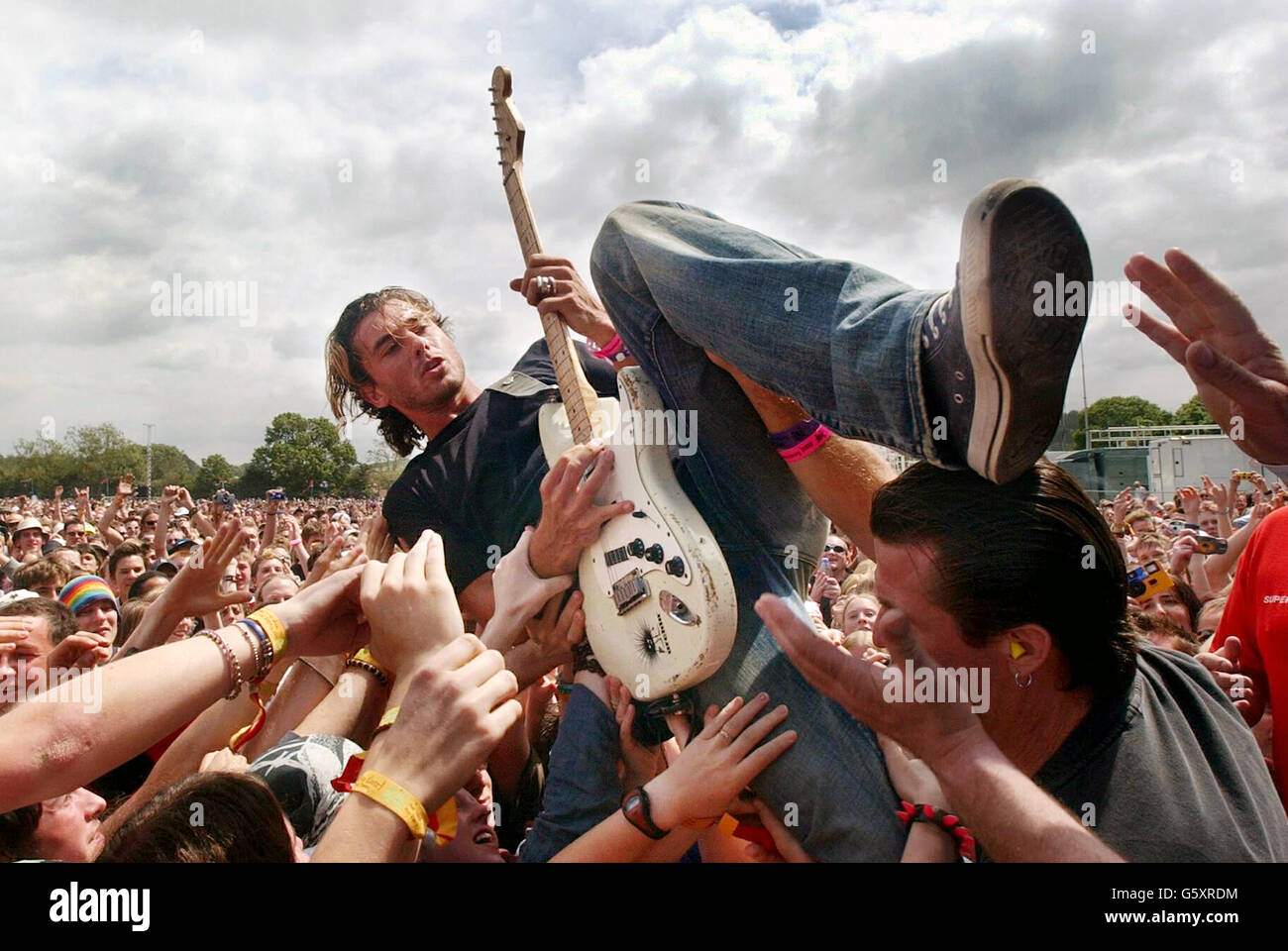 Gavin Rossdale of band, Bush, plays in the crowd at the Glastonbury Festival, at Pilton, Somerset. The festival is a complete sell out, and the weather forecast looks good for the thousands of music fans at the site. Stock Photo