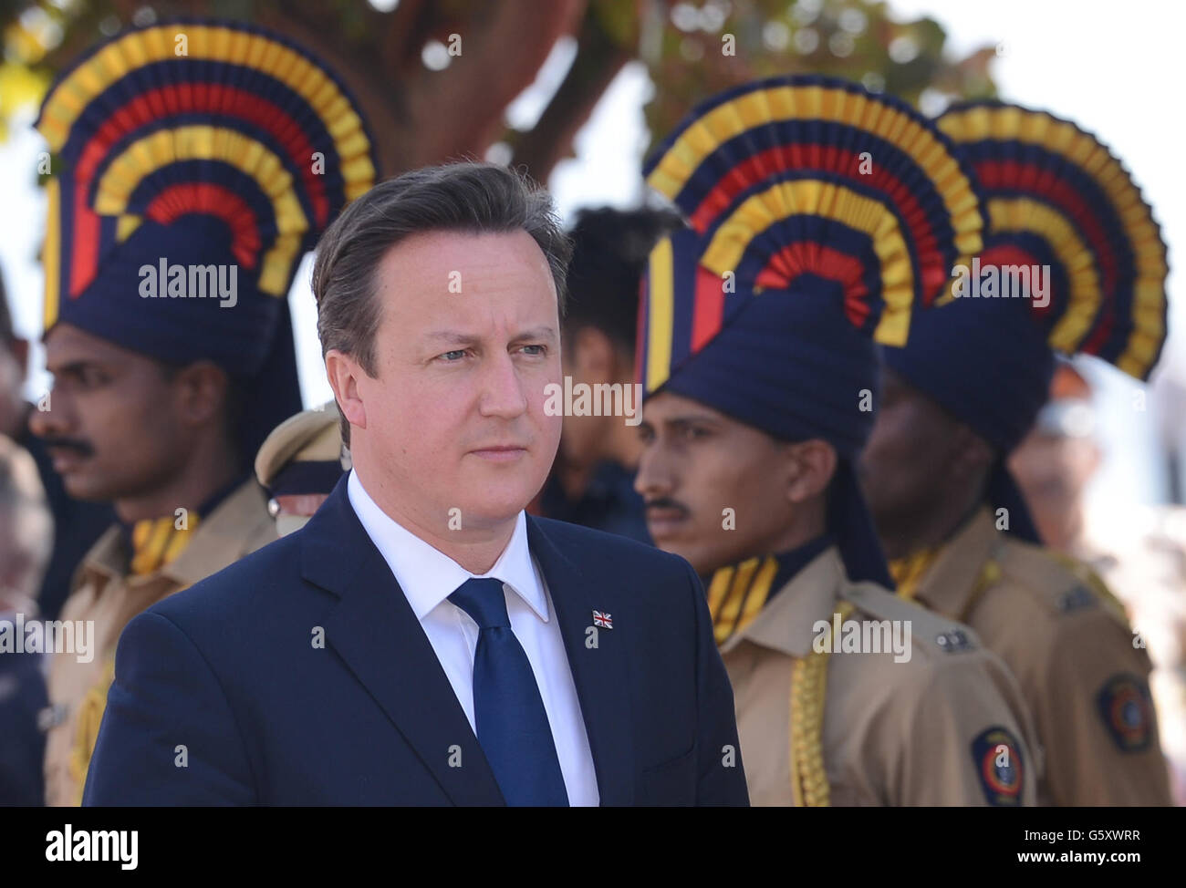 Prime Minister David Cameron arrives to lay a wreath at the memorial to commemorate the policemen who were killed in the terrorist attacks of November 2008, in Mumbai, India. Stock Photo