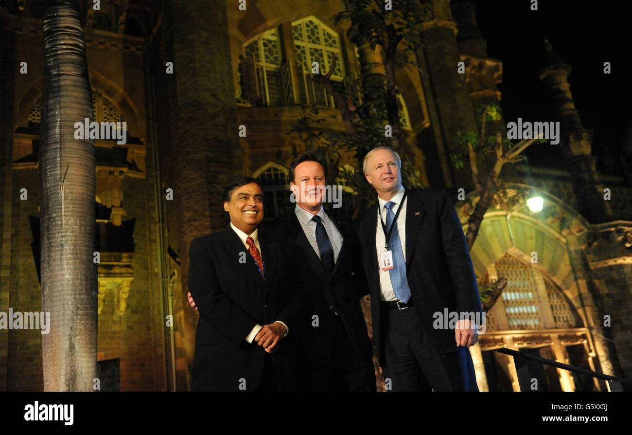 Prime Minister David Cameron attends a reception at the Museum of Mumbai for Indian and British businessmen and women and hosted by the CEO of BP Bob Dudley (right) and Mukesh Ambani (left) of the Indian firm Reliance and the richest man in India. PRESS ASSOCIATION Monday February 16 2013. Mr Cameron is on a three day trade visit to India where he will later hold talks with his Indian counterpart Dr Manmohan Singh in Delhi. See PA story POLITICS Cameron. Photo credit should read: Stefan Rousseau/PA Wire Stock Photo