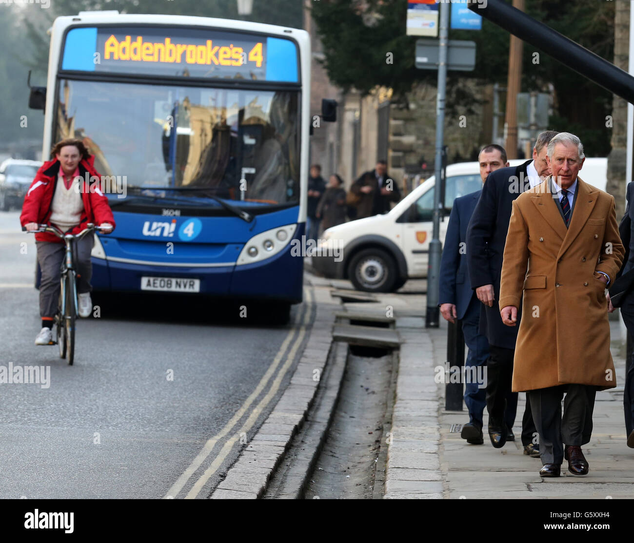 The Prince of Wales makes the short walk from The Fitzwilliam Museum, to The Pitt Building, on Trumpington Street in Cambridge during a visit to the City where he attended a reception and met with students studying from overseas at The University of Cambridge. Stock Photo
