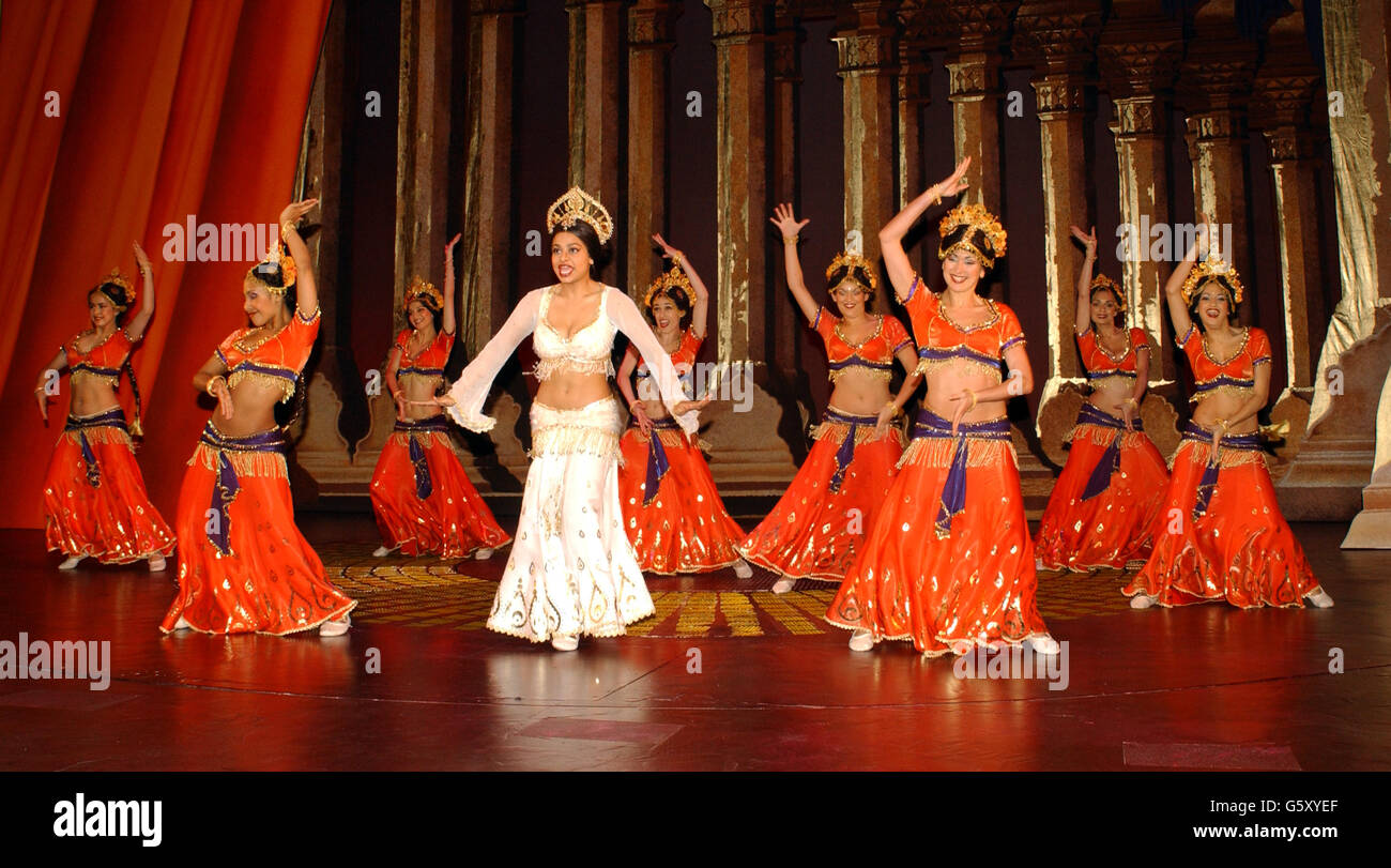 Actress Ayesha Dharker, who plays Rani leads the dancers during a rehearsal of AR Rahman's musical 'Bombay Dreams', produced by Andrew Lloyd Webber at the Apollo Theatre in Victoria, London. Stock Photo