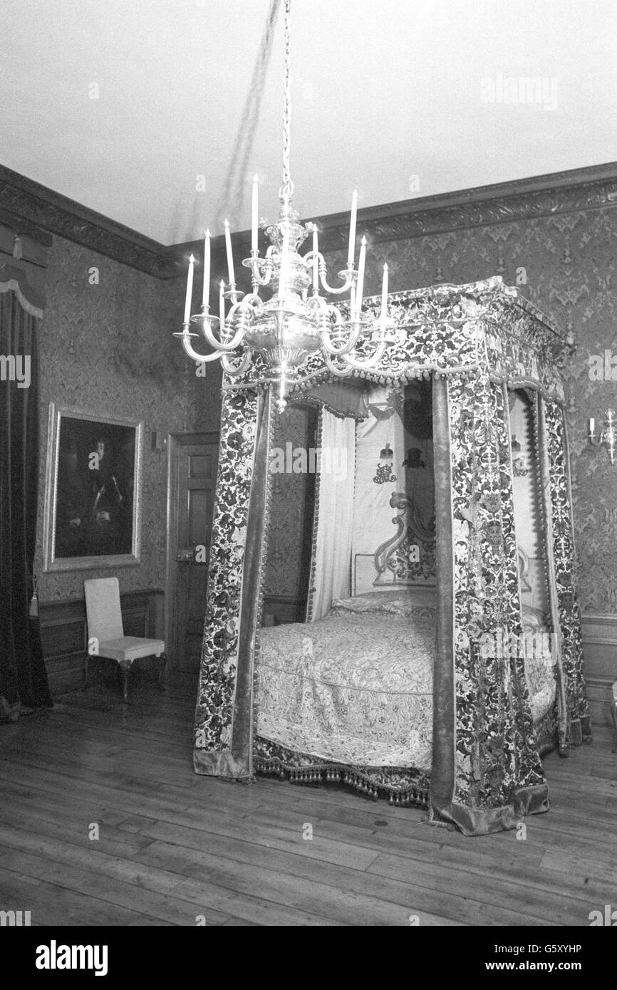 The four-poster bed in the Queen's bedchamber at Kensington Palace, where the State Rooms have been opened to the public. Stock Photo