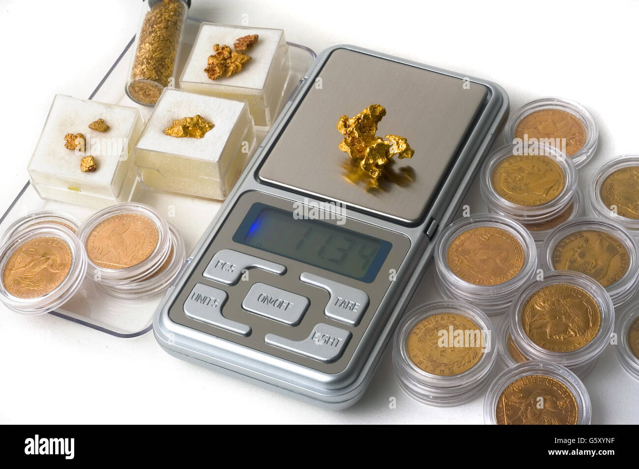 Balance scales with coins hi-res stock photography and images - Alamy