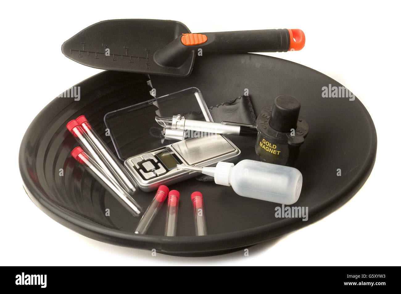 Set of tools required to gold panning in the river as a pan, shovel, and  tubes Stock Photo - Alamy