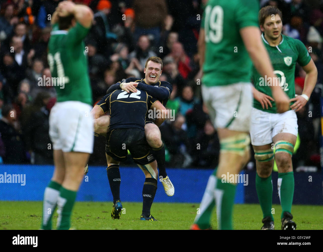 Scotland's Staurt Hogg and Duncan Weir celebrate winning during the RBS 6 Nations match at Murrayfield, Edinburgh. Stock Photo