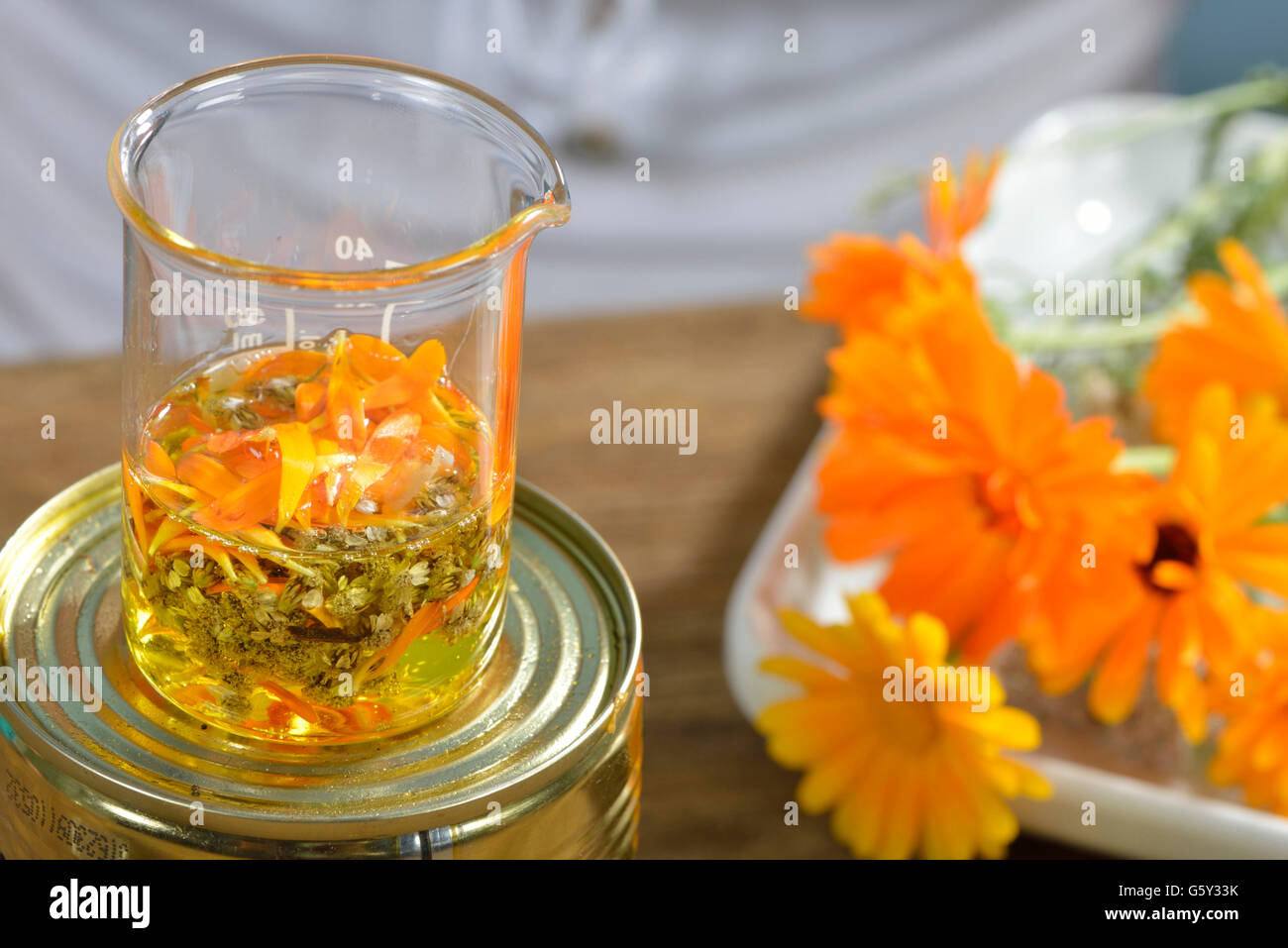 Production yarrow and marigold ointment / (Calendula officinalis), (Achillea millefolium) Stock Photo