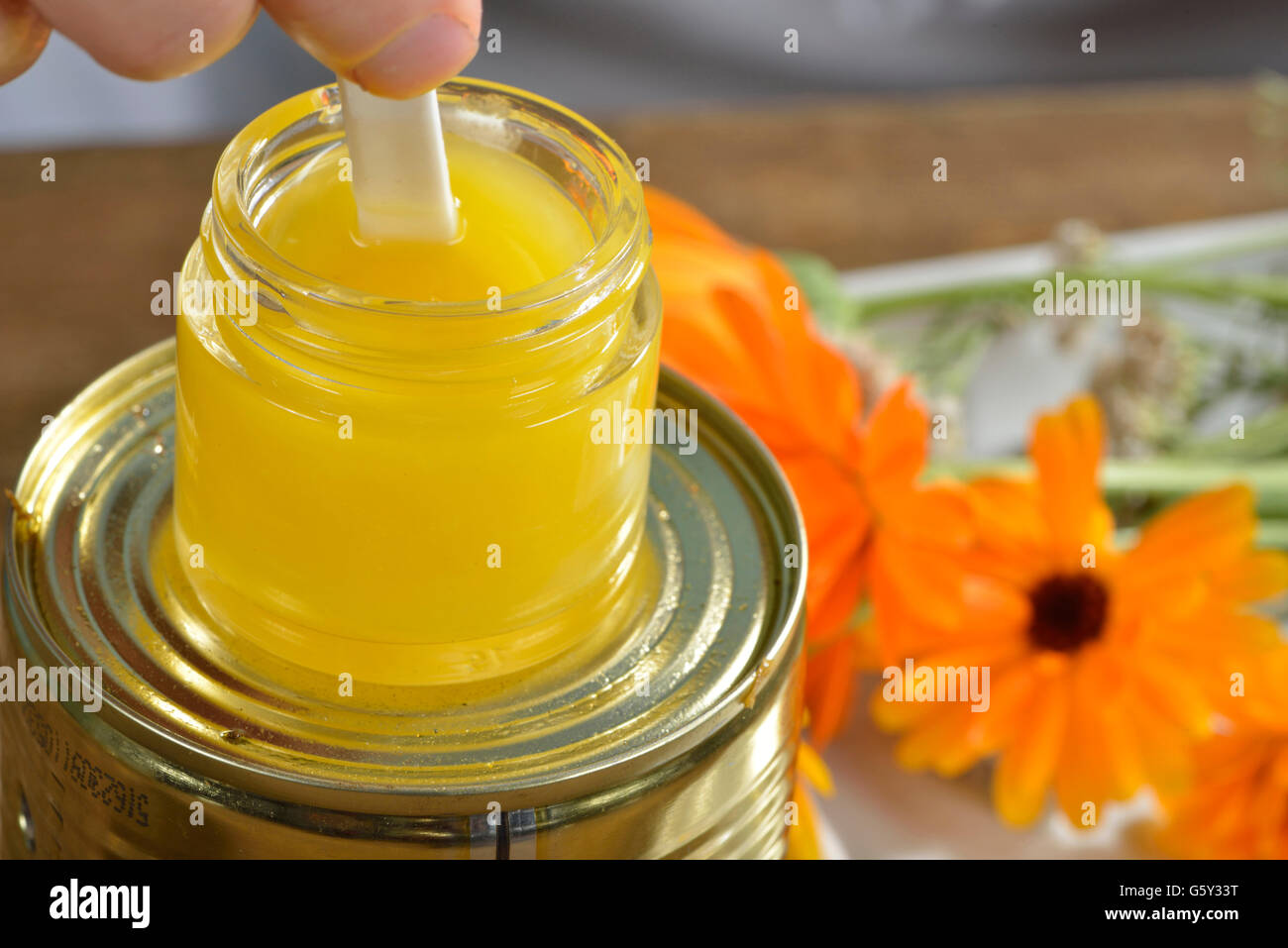 Production yarrow and marigold ointment / (Calendula officinalis), (Achillea millefolium) Stock Photo