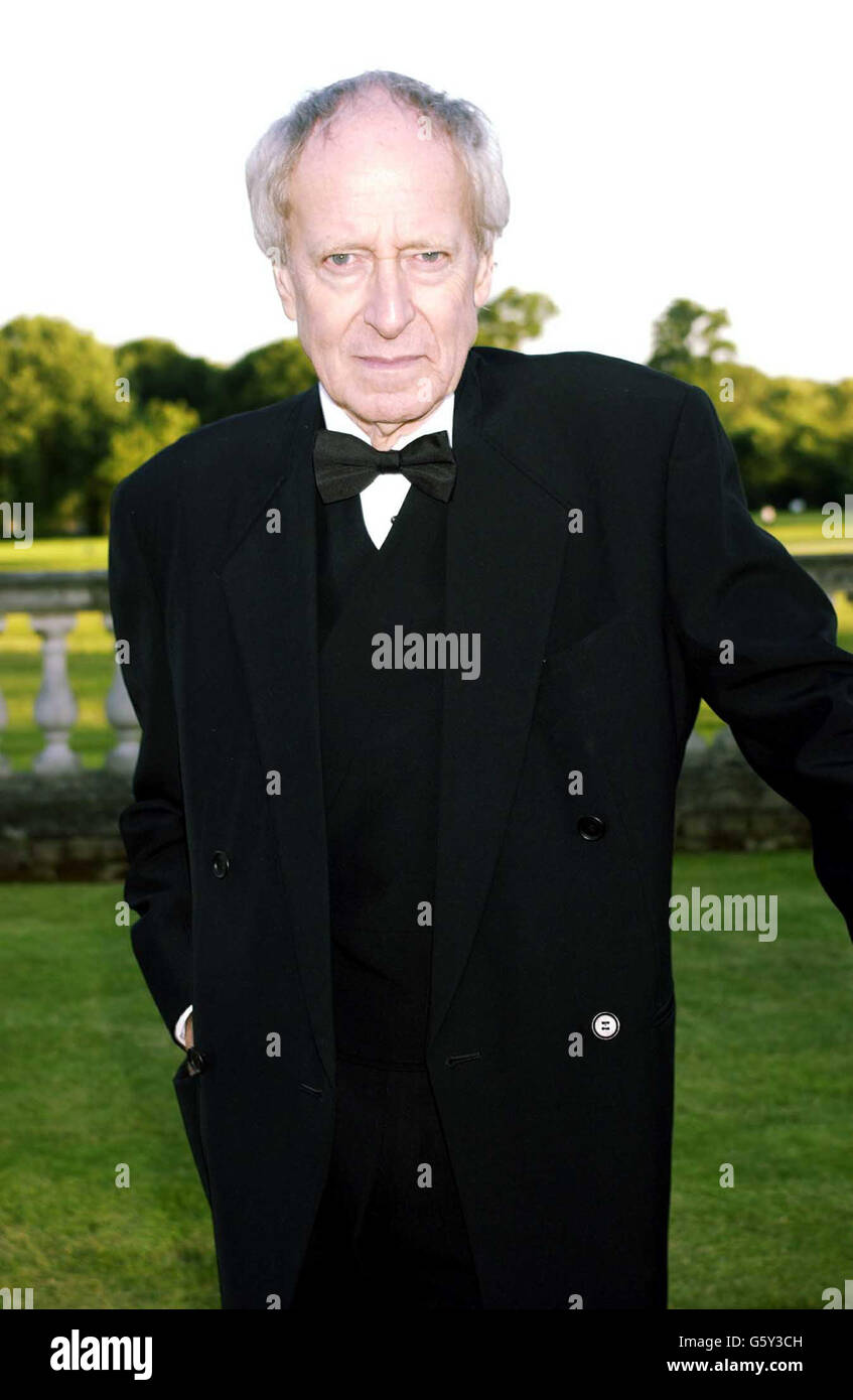 007 theme tune composer John Barry arrives for the 007 James Bond Gala Dinner celebrating forty years since Dr No in aid of the Ian Fleming Foundation and the Variety Club of Great Britain, at Stoke Park Golf Club in Stoke Poges, Buckinghamshire. Stock Photo