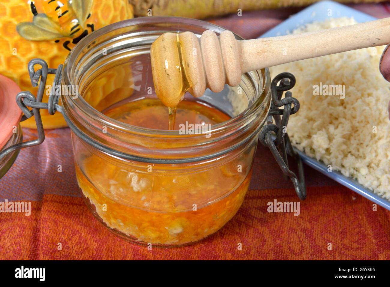 Production Horseradish syrup with honey / (Cochlearia armoracia) Stock Photo