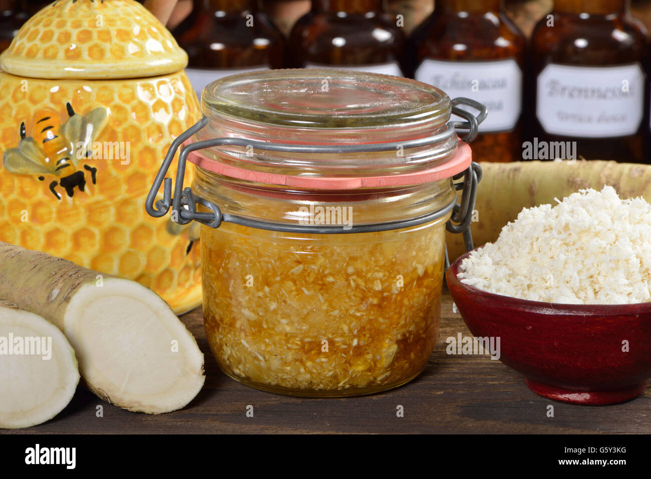 Production Horseradish syrup with honey / (Cochlearia armoracia) Stock Photo