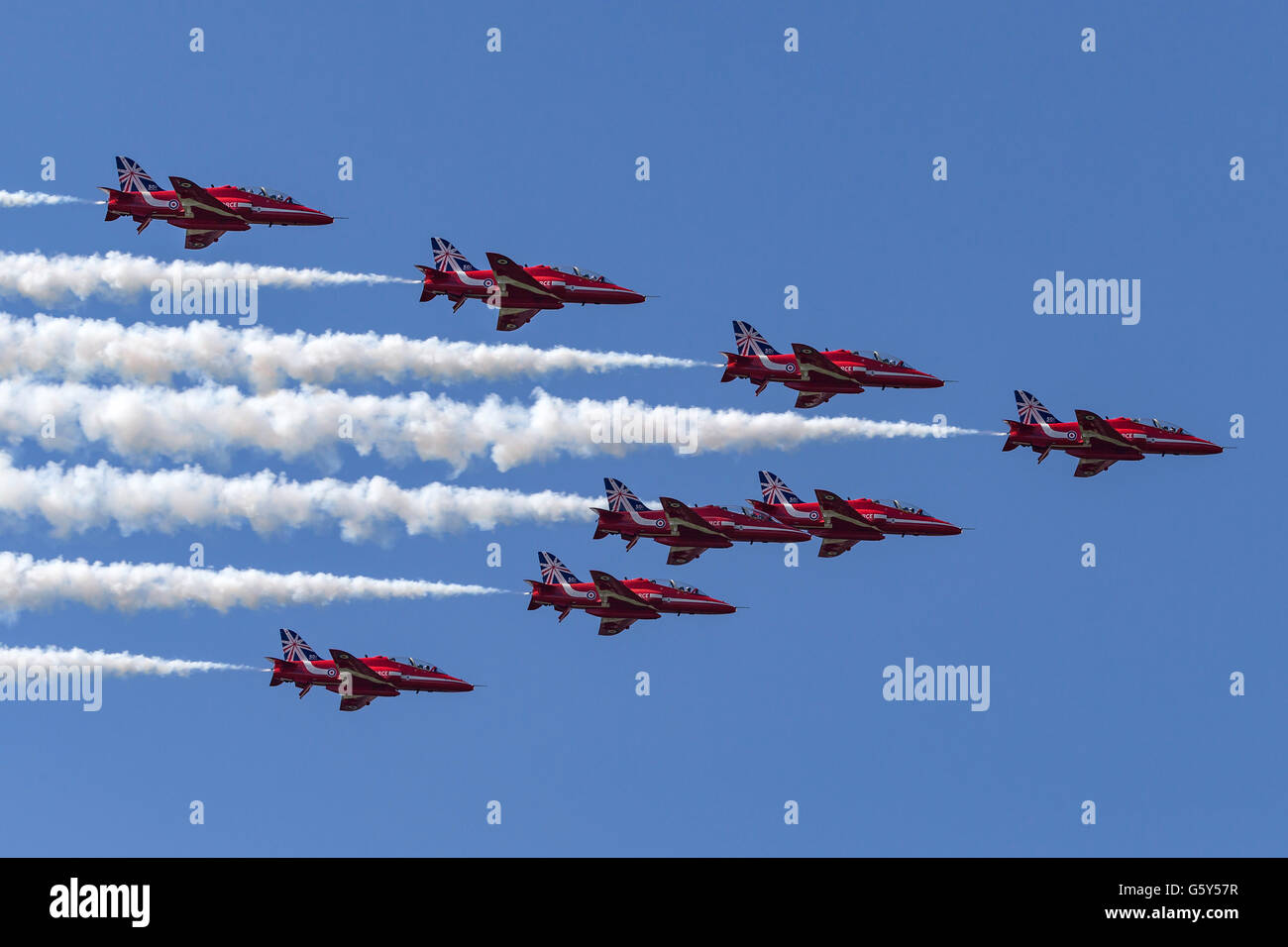 Royal Air Force (RAF) Red Arrows aerobatic display team performing at the Farnborough International Airshow Stock Photo