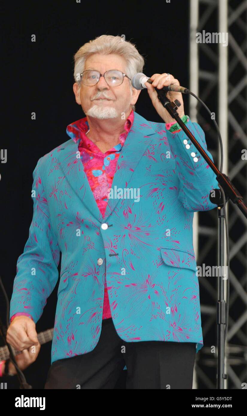 Rolf Harris plays Glastonbury. Rolf Harris performing on the Pyramid Stage, during the final day of the Glastonbury Festival in Somerset. Stock Photo