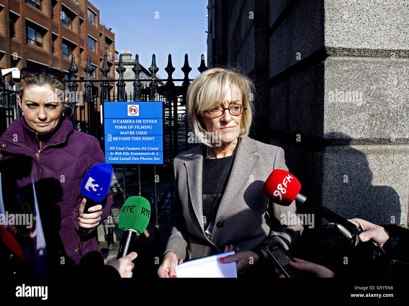 Marion Campbell, the solicitor for the genetic mother of twins born to a surrogate, reads a statement on her behalf to journalists outside The High Court after she won a landmark case in Ireland to be recognised on their birth certificates. Stock Photo