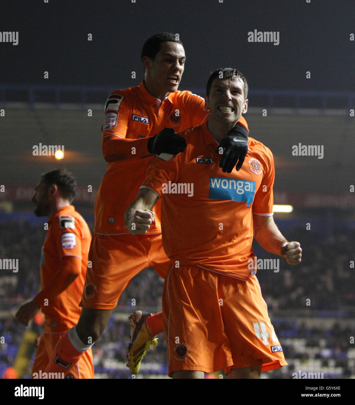 Blackpool's Kirk Broadfoot (right) celebrates scoring their equalising goal with teammate Thomas Ince (left) Stock Photo