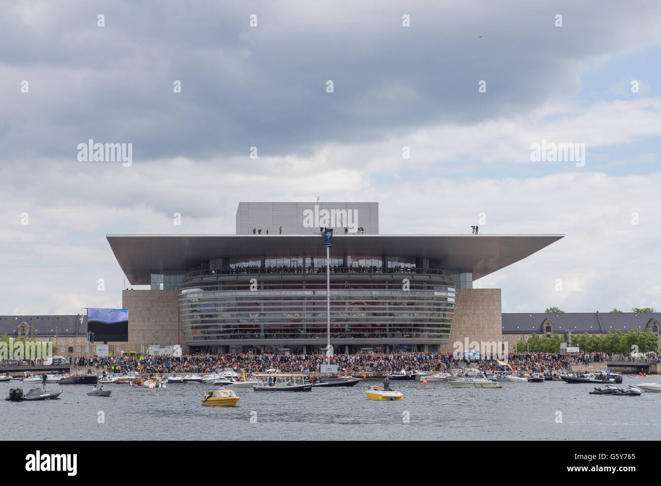 Copenhagen, Denmark - June 18, 2016: Cliff Diver ready to jump from Opera House at Red Bull cliff diving event. Stock Photo