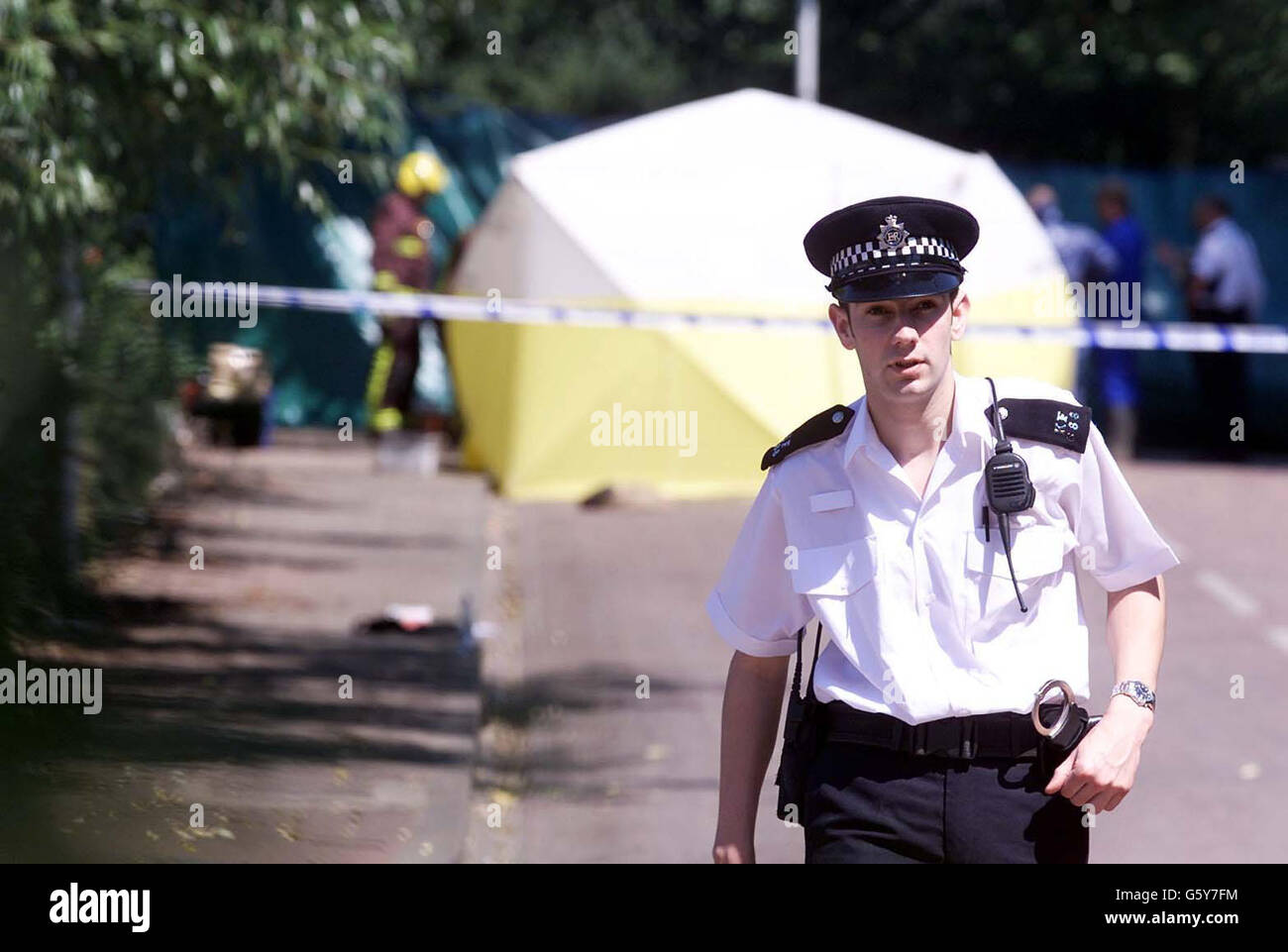 The scene in West Ham, east London, where the bodies of four children and a man were found in a burnt-out car after emergency services were called out following reports that a silver Nissan Primera was on fire. *The five bodies are believed to be those of an adult black male and four black children. Stock Photo