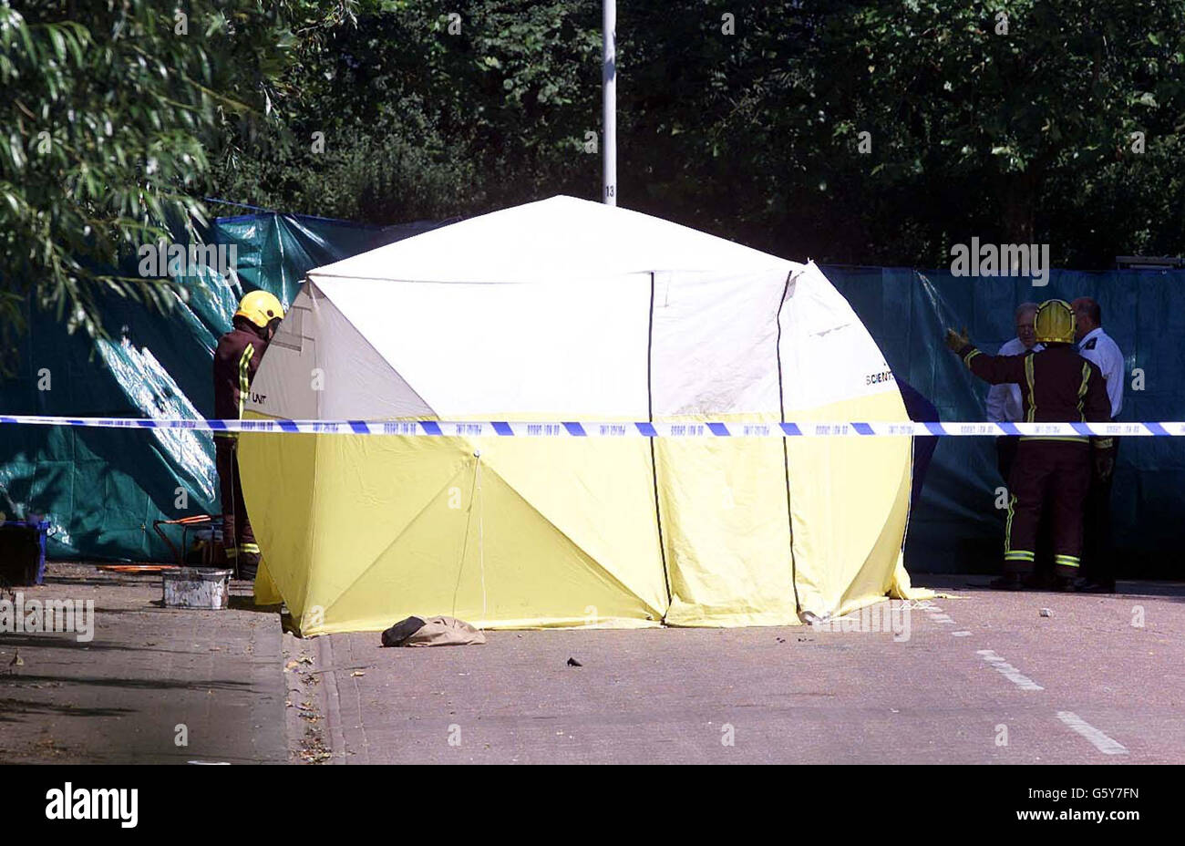 The scene in West Ham, east London, where the bodies of four children and a man were found in a burnt-out car after emergency services were called out following reports that a silver Nissan Primera was on fire. *The five bodies are believed to be those of an adult black male and four black children. Stock Photo
